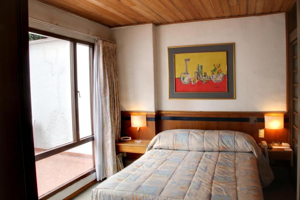 Real 85 Aparthotel