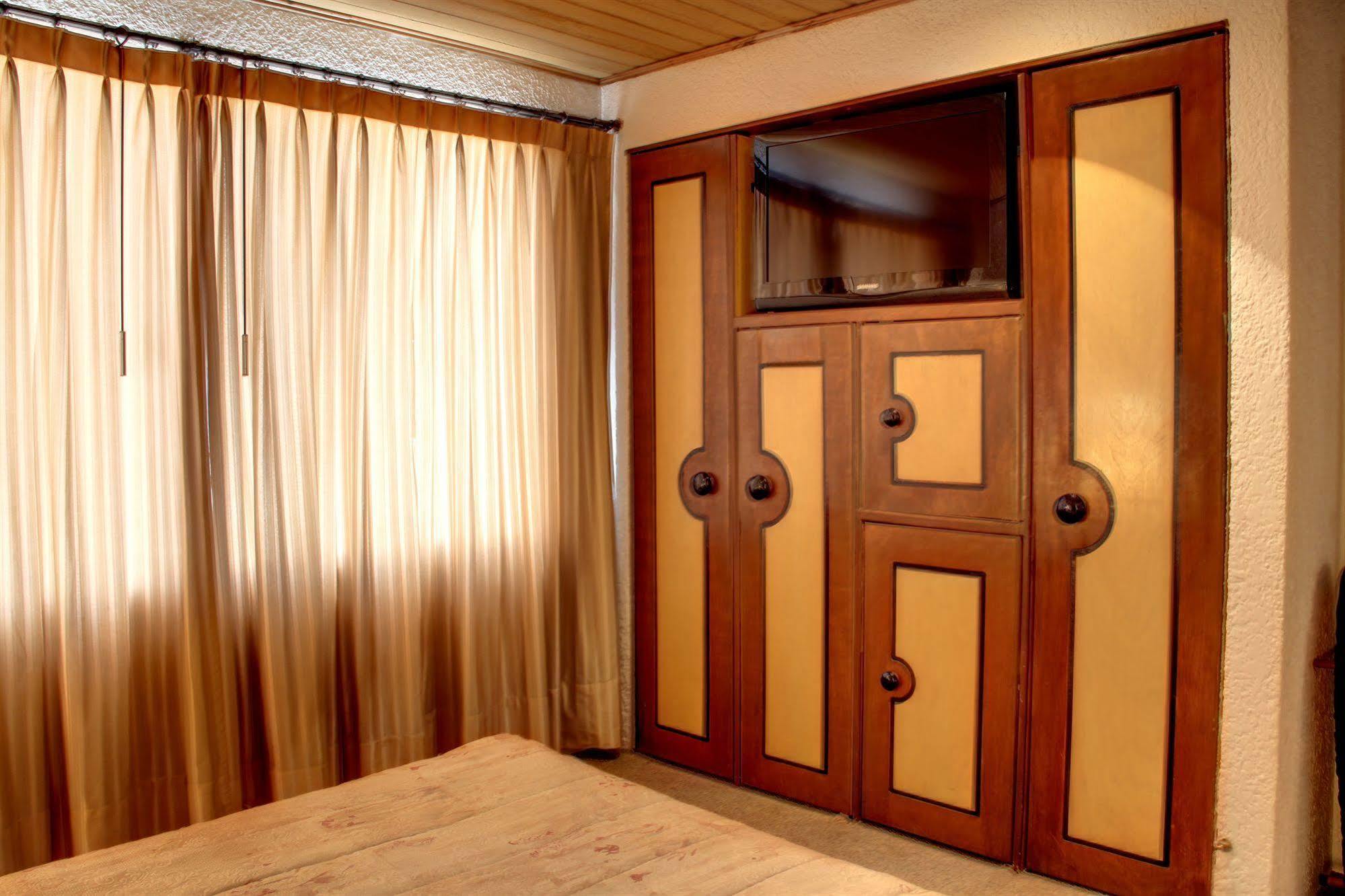 Aparthotel Real 97